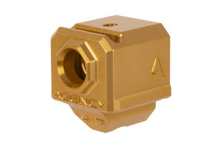 The Agency Arms 417 single port compensator for Glock handguns features a gold anodized finish
